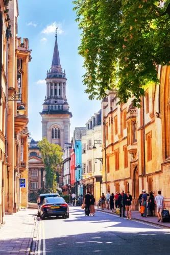 vertical-street-view-historical-buildings-oxford-uk-england-may-people-walking-central-city-area-historic-322459785